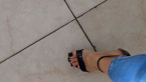 Katherine sexy highly arched feet on high Heels in the office