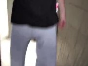 Freeballing in grey sweats showing VPL