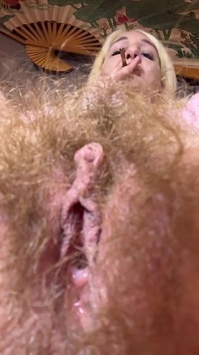 Closeup on My Hairy Cunt While Smoking a Cigar