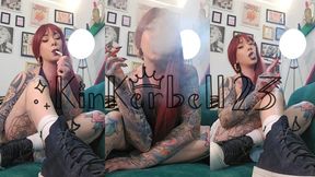 Smoking goddess enjoying a cigarette wearing converse trainers and short skirt- Kinkerbell23