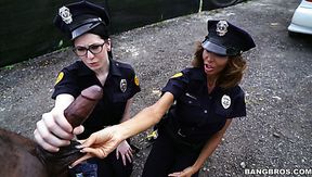 Two horny police officers Norah Gold and her colleague fuck a black guy