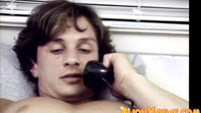 Hunks are stroking their cocks together in vintage video