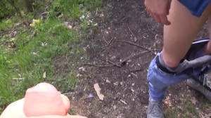 Czech lad with nice blond hair drills in a park