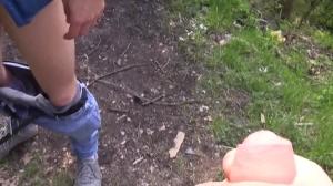 Czech lad with nice blond hair drills in a park
