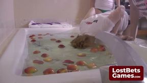 A classic Strip Ducking for Apples turns into a seductive challenge