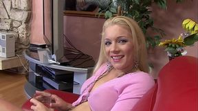 Heidi Mayne is a beautiful blonde, who sits on her couch giving you an upskirt of her hot...