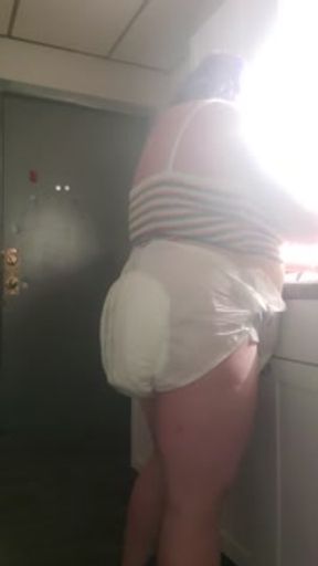 Dancing in Diapers doing dishes