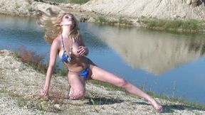 Sexy blonde shows off her hot body outdoor