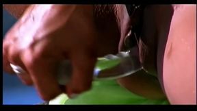 Latina beauty wanks with toy on beach