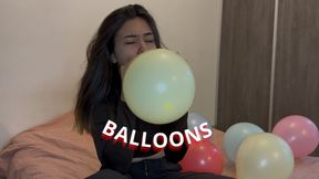 Blowing up & popping balloons