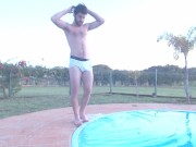 white wet boxers fine-looking young hot guy shows off at the pool