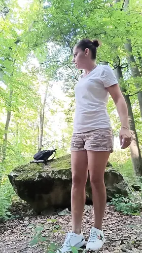 Women's pussy is filled by a stick.