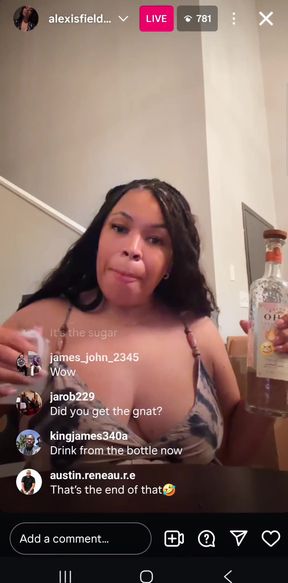 Big-titted ebony milf flashes nipple at celebrity event