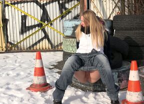 Blonde hot white girl pulls down her jeans and pisses on the tires