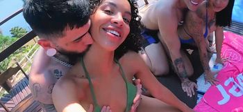 Outdoor foursome by the pool with two curvy Latina swingers