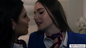 Trans flight attendant Zariah Aura fucks her busty coworker