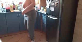 Washing dishes topless