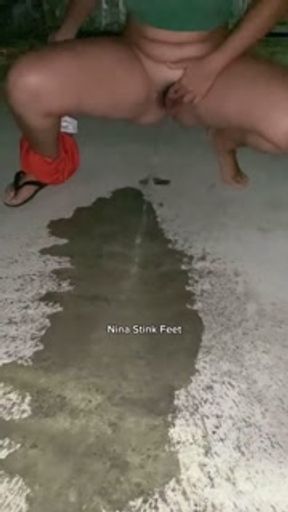 Girl pissing on the Street! Public Nude peeing