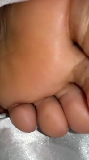 Ebony Girl Under Her Covers in Bed Show off Feet