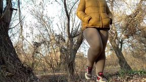 Wet pussy of a mature milf squatting and peeing