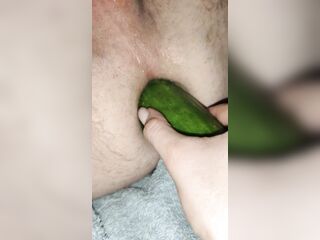 My wife is screwing my booty with a biggest cucumber.