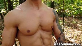 Muscular stud Angelo Godshack wanks off his cock outdoors