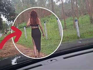 flashing his rod at a hotty in the car!