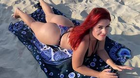 Curvy and liberated ginger bitch gives an amazing head at a public beach