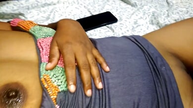 South Asian woman explores her body with a vibrator while her partner joins for intimate foreplay