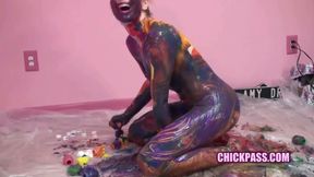 Kinky coed Lina is covered in paint