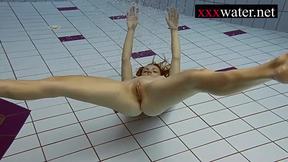 ”Hot sexy babe swimming in the pool”