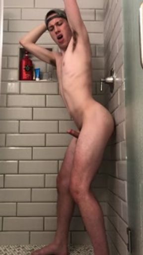 20 year old Jesse Gold wall fucks his dildo until he busts