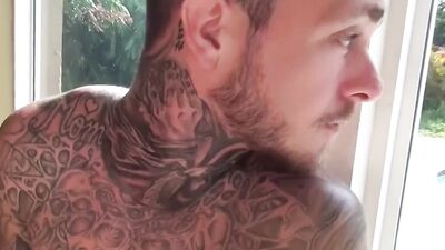 Tattooed jock Brian Michaels masturbates solo and cum blasts