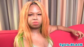 Chubby black tranny tugging in closeup