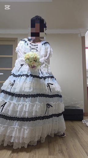 a cross-dresser dancing in a dress