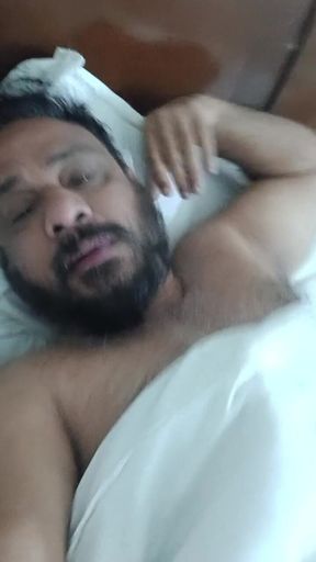 Indian Daddy Lying on the Bed Teasing and Posing for You
