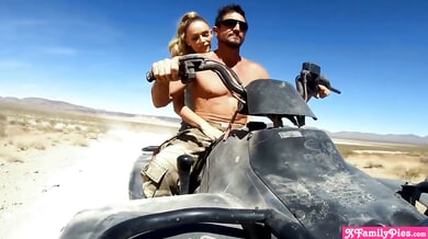 Blonde stepdaughter gives her military stepdad a handjob in the desert