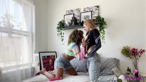 Sultry MILF and young blonde engage in steamy girl-on-girl action