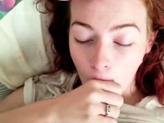 Delightful redhead teen milks a cock with her mouth in POV