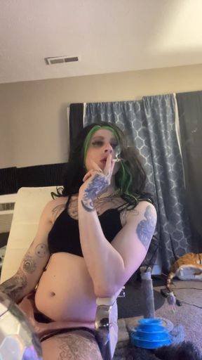 Sexy crossdresser smokes