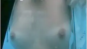 Sporty Sexy Doll Takes Shower Showing Perky Jugs Solo