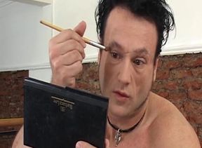 Nice makeup and big dildo for a horny guy