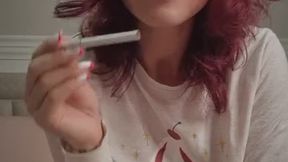 Licking and smoking white cigarette