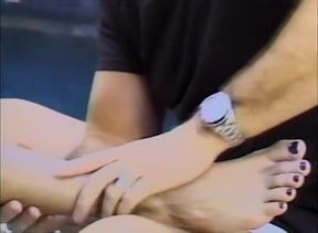 Horny guy getting dick foot rubbed by the pool