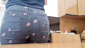 very rare and expensive jeans pierced by a rusty nail