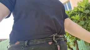 very rare and expensive jeans pierced by a rusty nail