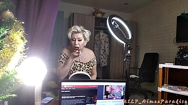 Hot Russian granny in a leopard costume smokes and talks about life until she starts sucking a young lover's dick