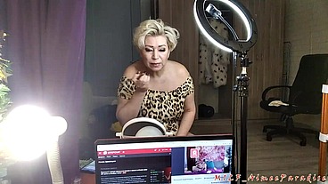 Hot Russian granny in a leopard costume smokes and talks about life until she starts sucking a young lover's dick