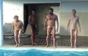 Four men at swimming pool