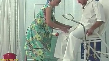 Ugly German granny gets her hairy pussy fisted at the clinic